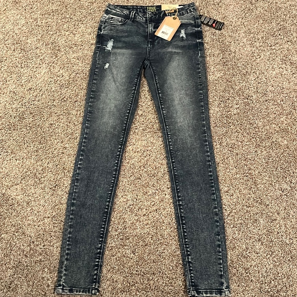 Mid rise stretch skinny jeans, size 3